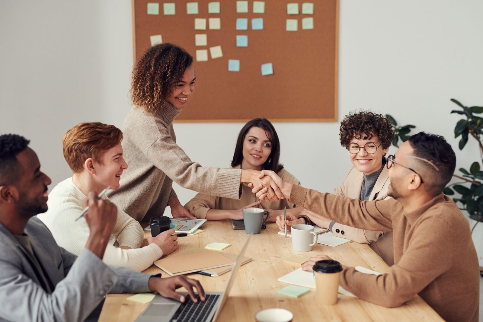 Young professionals collaborating around a table in a modern office